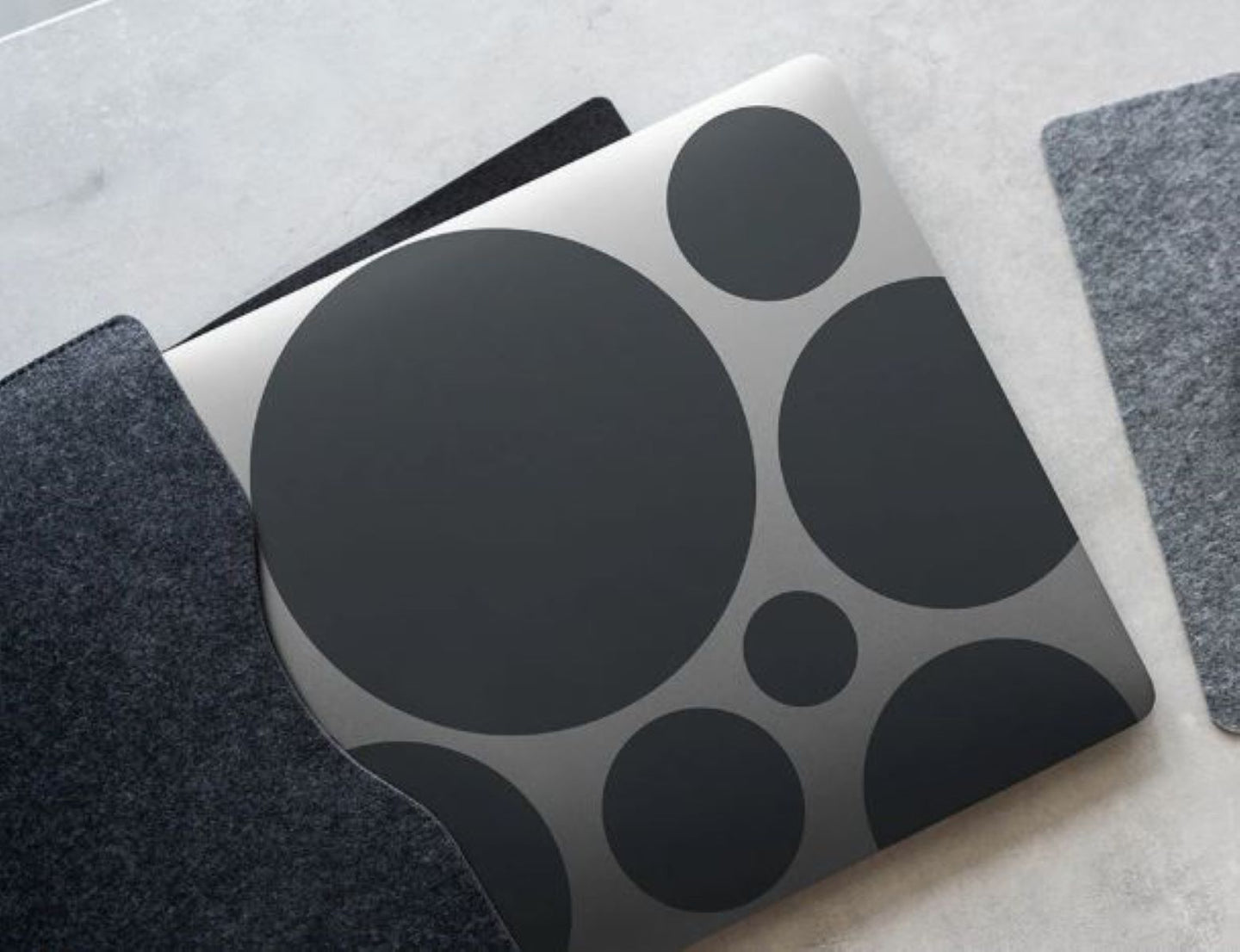 Black circular patterned mat on a textured surface