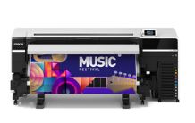 Large-format printer displaying a colorful design with 'Music Festival' text
