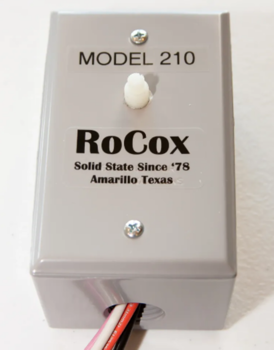 RoCox solid state device with Model 210 label on a white background