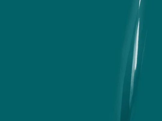 Close-up of a teal surface with a reflective line