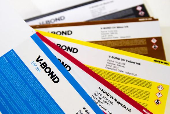 V-Bond UV ink samples in various colors on a white background
