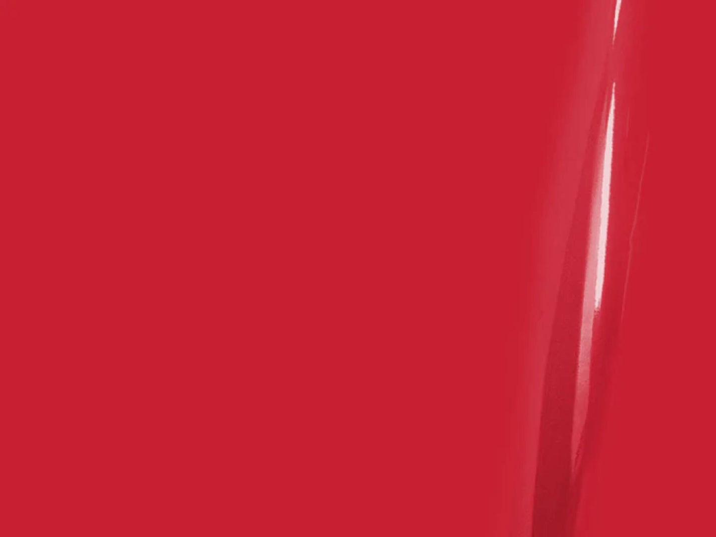 Close-up of a red surface with a glossy finish