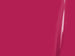 Close-up of a bright pink surface with a glossy finish