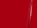 Close-up of a red surface with a glossy finish