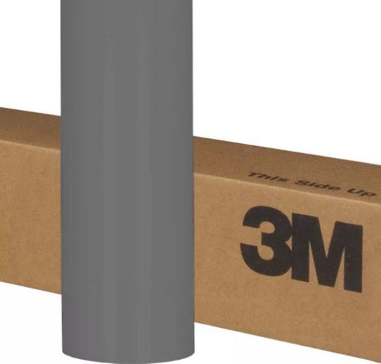 Gray vinyl roll with 3M branding on a cardboard box