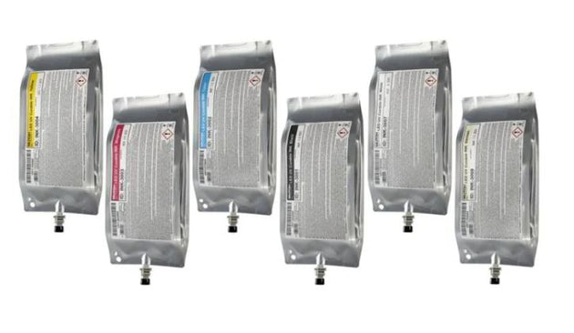 Set of six medical infusion bags on a white background