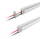 Light fixture with red and black wires on a white background