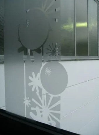 Decorative glass with abstract patterns on a building facade