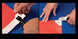 Two hands using a tool to cut red and white paper on a blue background.