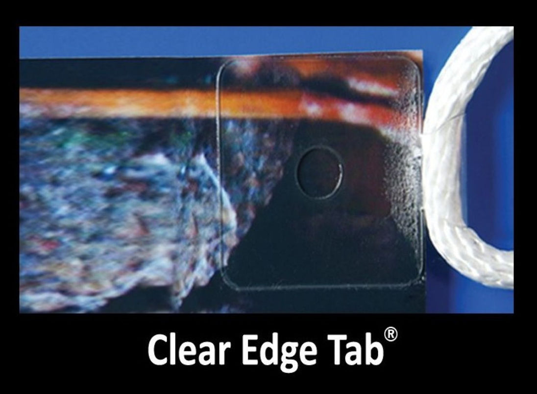 Clear Edge Tab product with textured surface and white cord on blue background