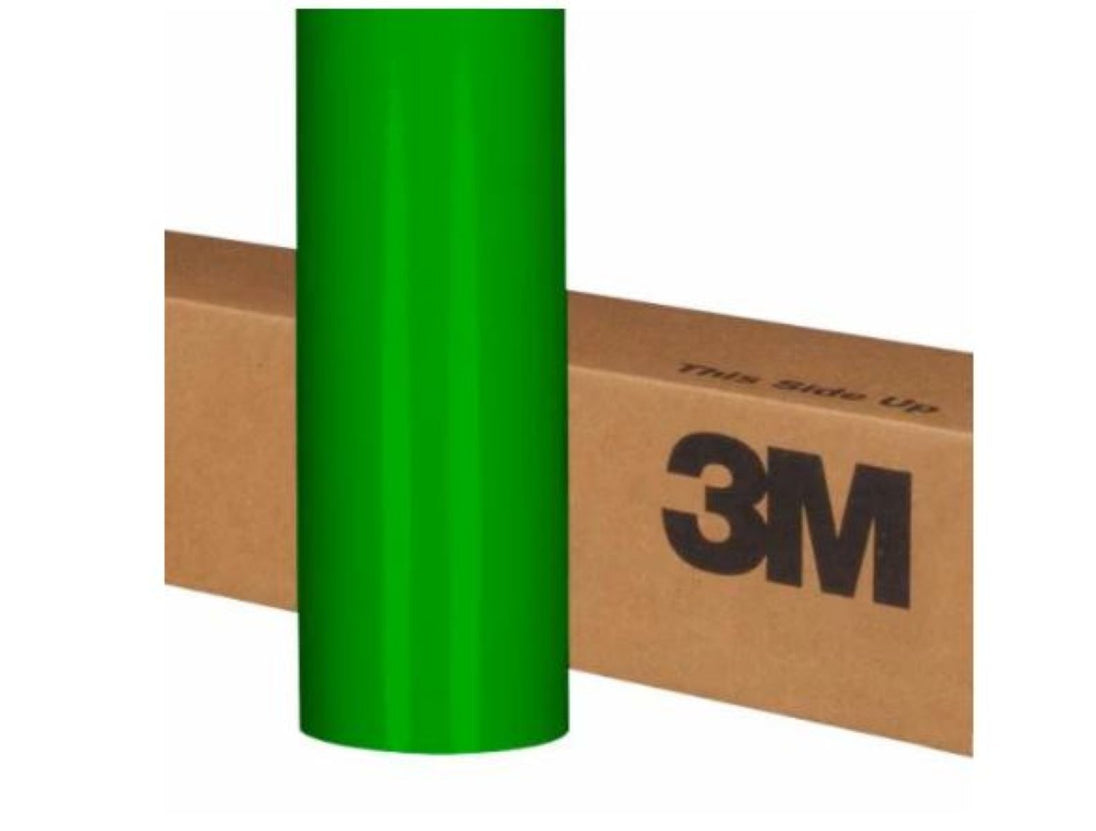 Green roll of 3M vinyl wrap on a cardboard box with 3M branding.