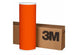 Orange roll of 3M vinyl wrap on a cardboard box with 3M logo.