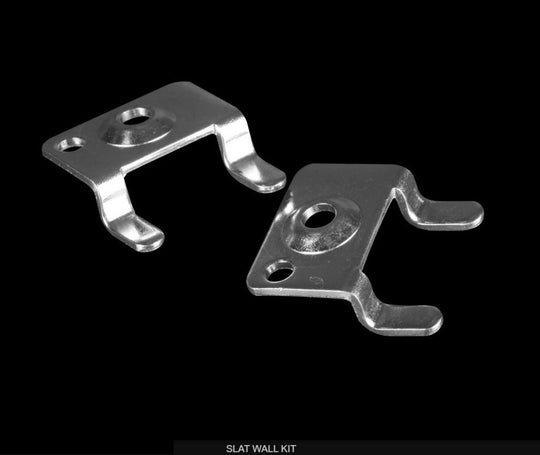 Two metal slat wall kit components on a black background