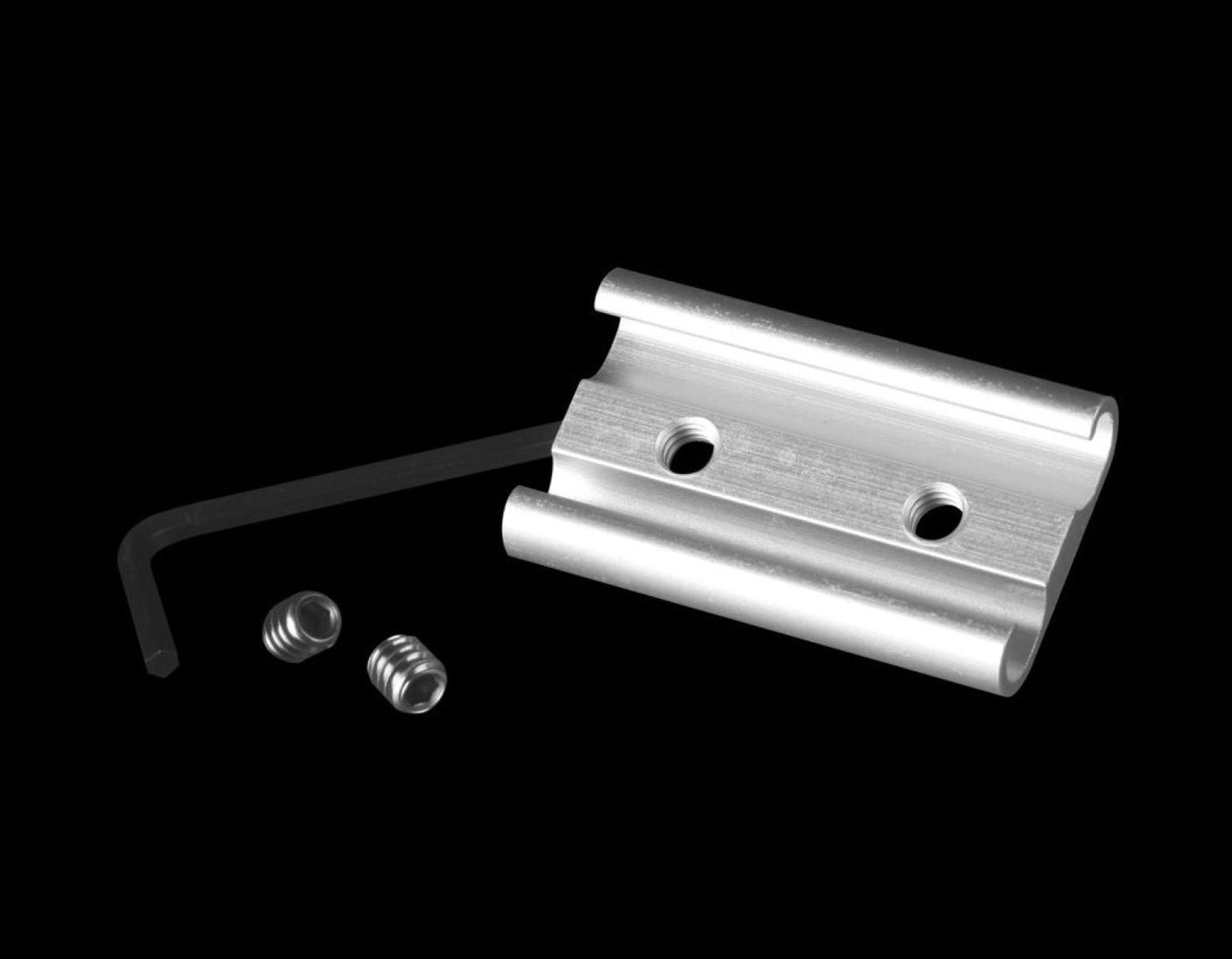 Metal bracket with screws on a black background