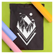 Siser EasyWeed application example showing a white mountain design on a dark T-shirt