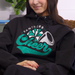 Siser Glitter cheer design on a black hoodie; application example