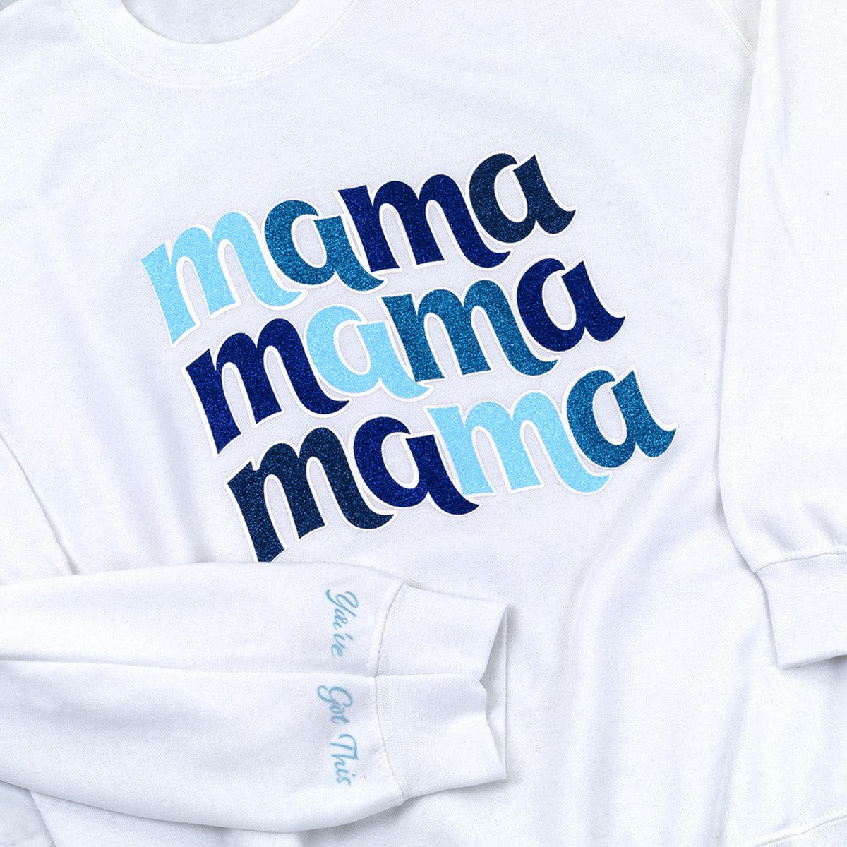 Multicolor Siser Glitter apparel design on a white sweatshirt; application example