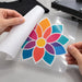 Illustrative application example: removing the original backing while the printed graphic stays supported by clear transfer mask