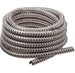 Coiled metal hose on a white background