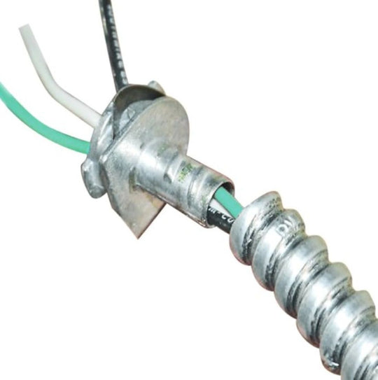 Metallic cable tie with green and white wires on a white background