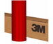 Red vinyl wrap roll with 3M branding on a cardboard box