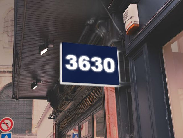 Building facade with a sign displaying the number 3630.
