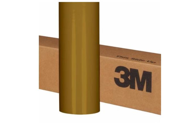 Roll of gold vinyl wrap on a cardboard box with 3M branding.