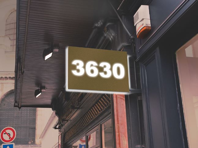 Digital display showing the number '3630' on a building exterior.