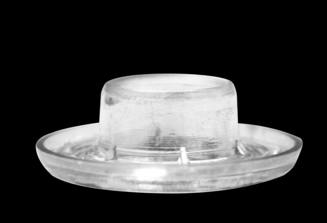 Clear plastic hat on a black background