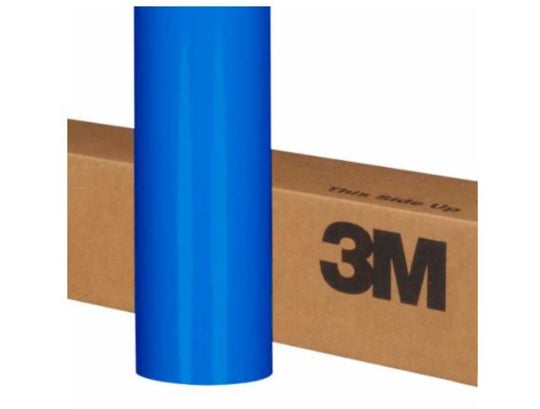 Roll of blue 3M vinyl wrap on a cardboard box