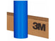 Roll of blue 3M vinyl wrap on a cardboard box