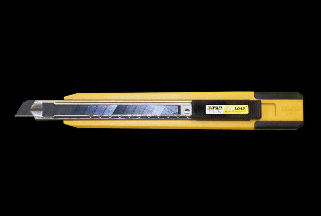 Yellow and black utility knife on a black background
