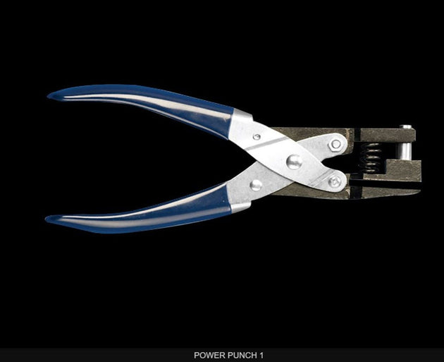 Metal hole punch with blue handles on a black background