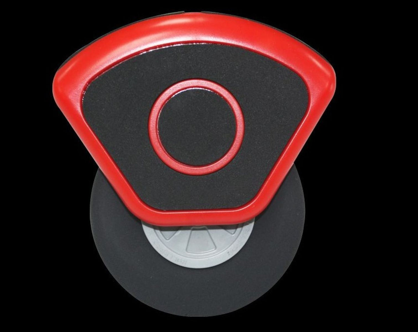 Red and black object on a black background