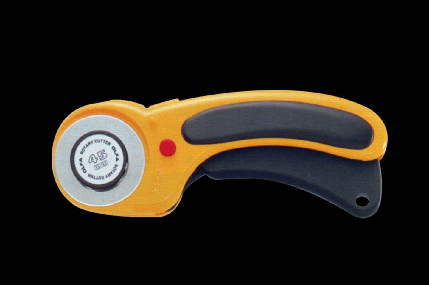 Yellow rotary cutter on a black background