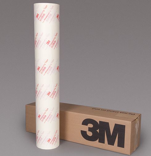 Roll of 3M paper with a cardboard box on a gray background