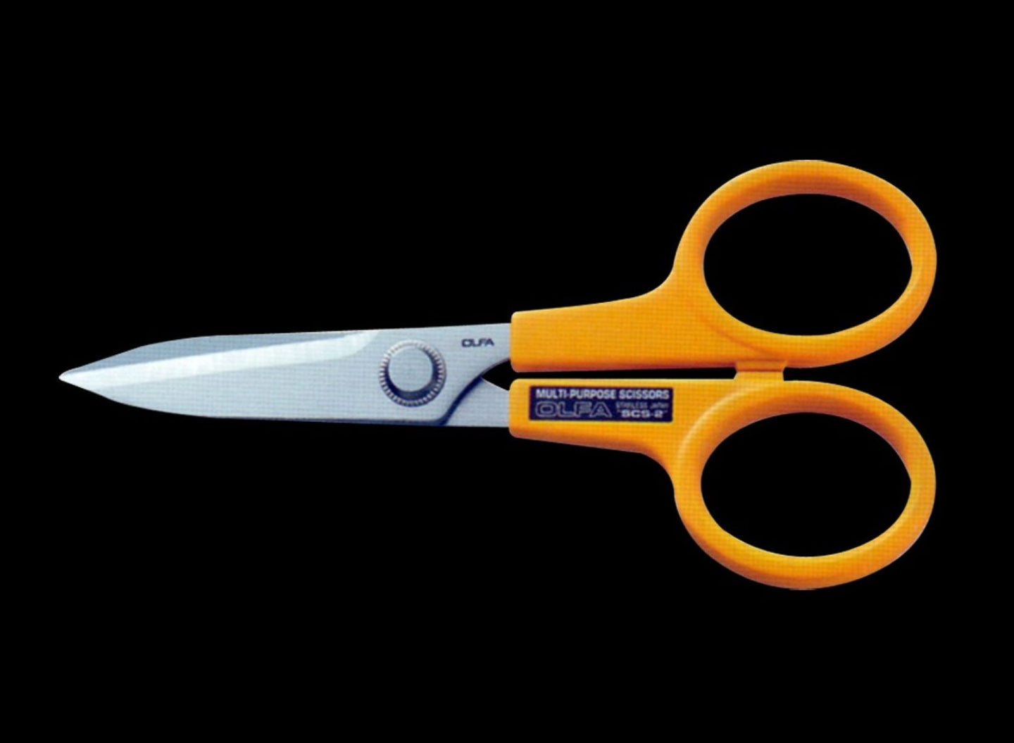 Orange-handled scissors with a visible brand logo on a black background