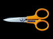 Orange-handled scissors with a visible brand logo on a black background