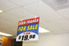 Promotional sign for sign frames on sale in a store setting