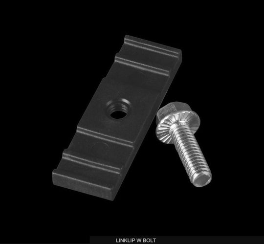 Black metal clip with a bolt on a black background