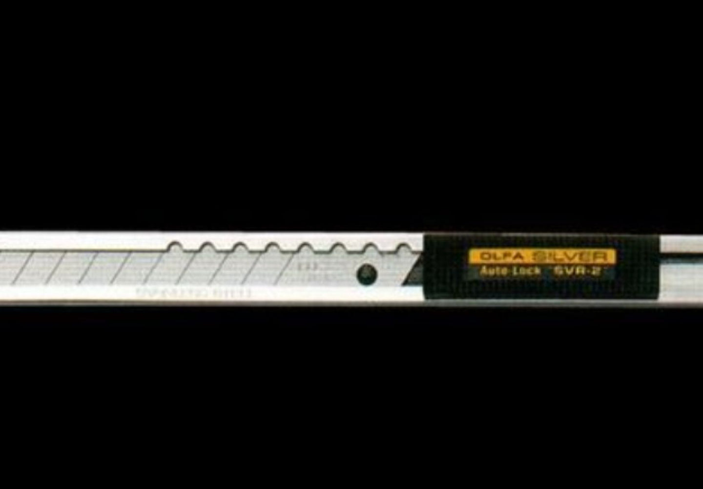 Olfa knife with a black background