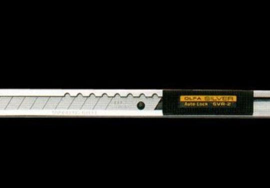 Olfa knife with a black background