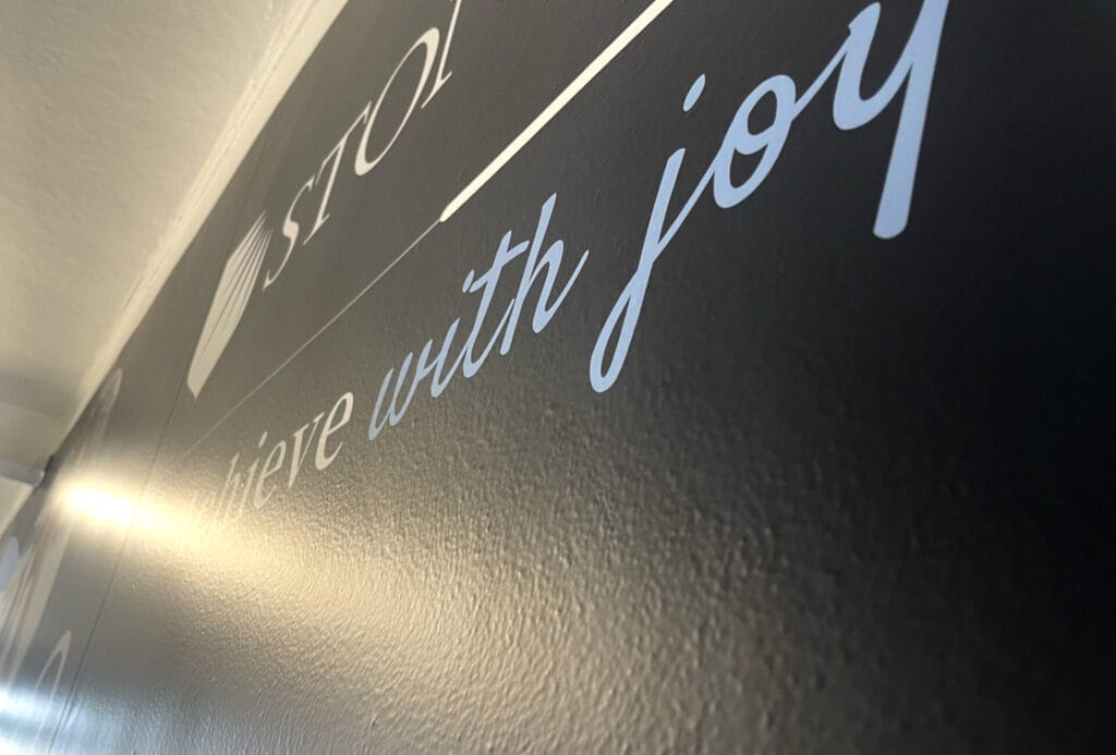 Close-up of Drytac Polar Grip Air applied to a textured interior wall at Stonar School