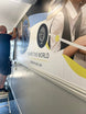 Installer applying Drytac Polar Grip Air wall graphics at Stonar School