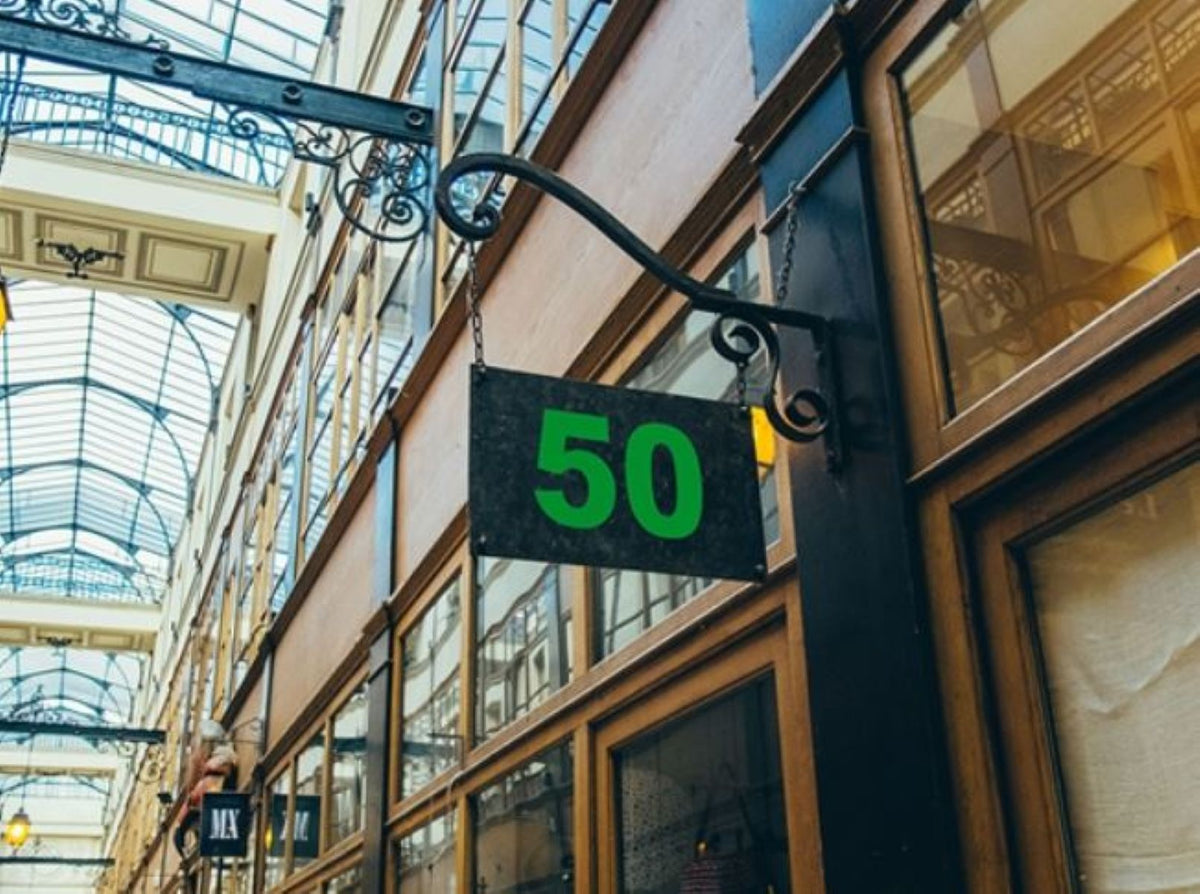 3M 50 Scotchcal Bright Green 745 sign lettering application example; striping is supplied in the selected width.
