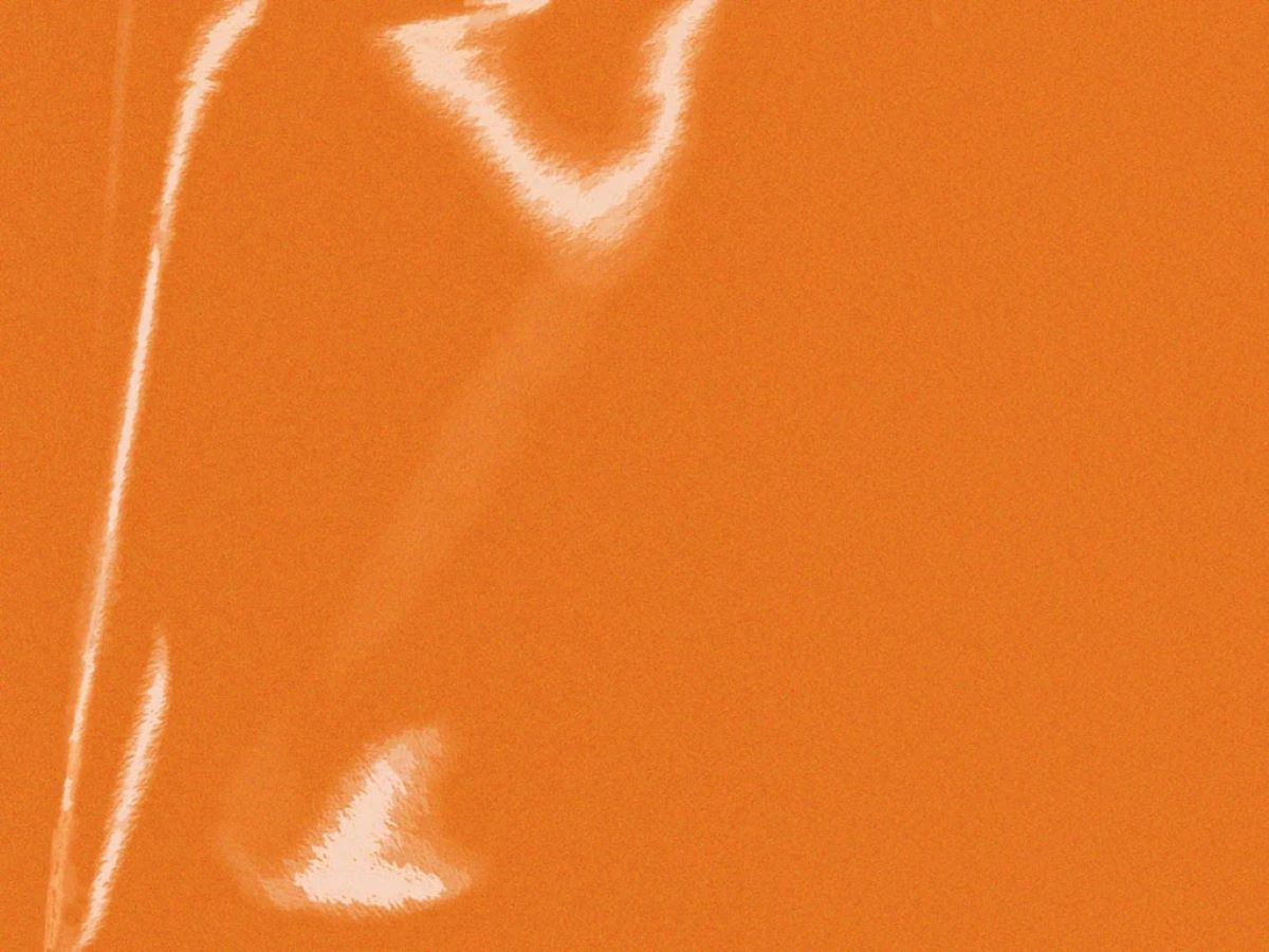 Lumina 2409 Orange (009) utility-grade reflective film material reference; supplied in the selected custom-cut striping width and length.
