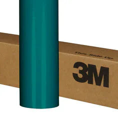 Turquoise vinyl wrap roll with 3M branding on a cardboard box