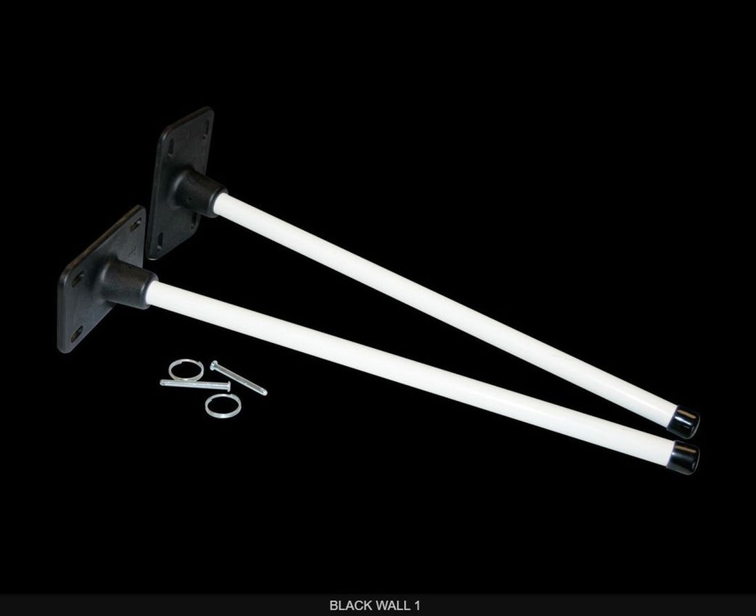 Two white metal brackets with mounting hardware on a black background