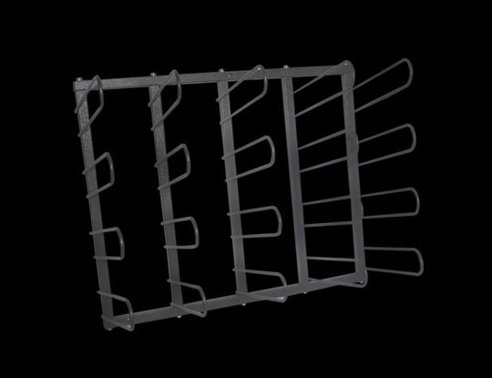 Metal wire rack on a black background
