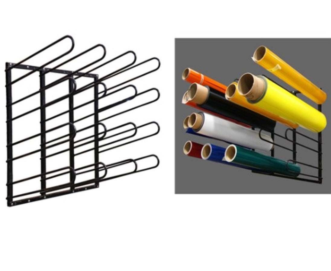 Black metal wire rack with rolls of vinyl on a white background